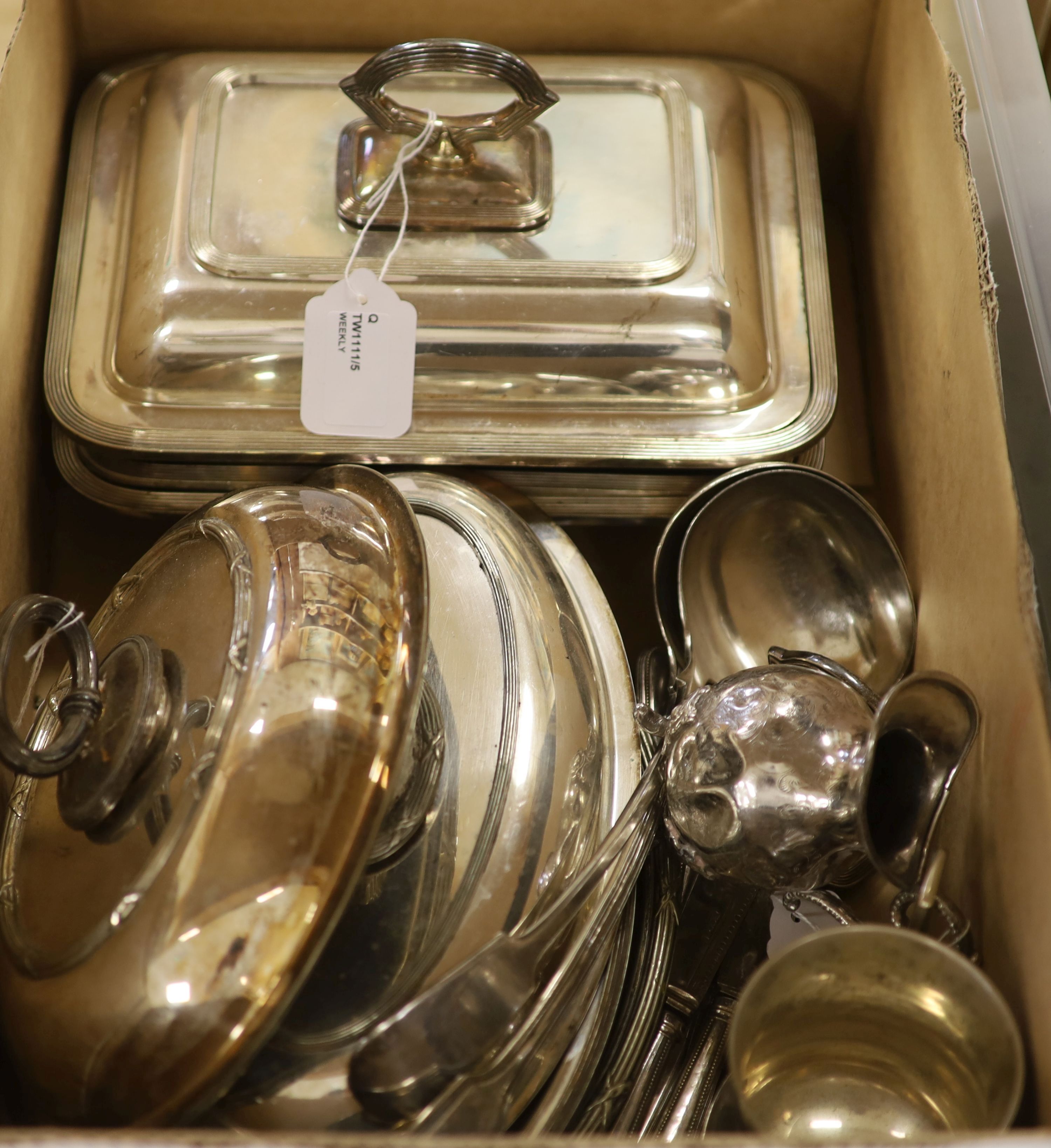 A collection of plated items, including three entree dishes and covers, etc.